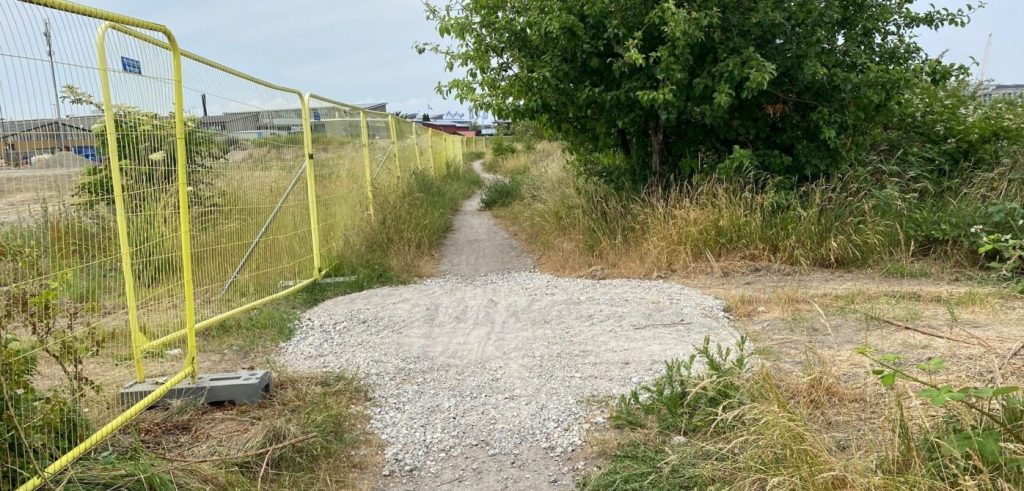 Stejlepladen-byggepladshegn-e1688376640137-1024x491